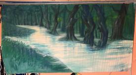 Bras de rivière, forêt verte