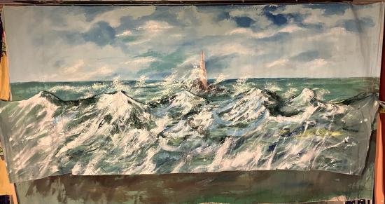 La mer, les vagues, le phare au loin